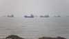 A British maritime agency reported on Monday that a ship caught fire in the Strait of Hormuz, at a time when the United States and Iran are